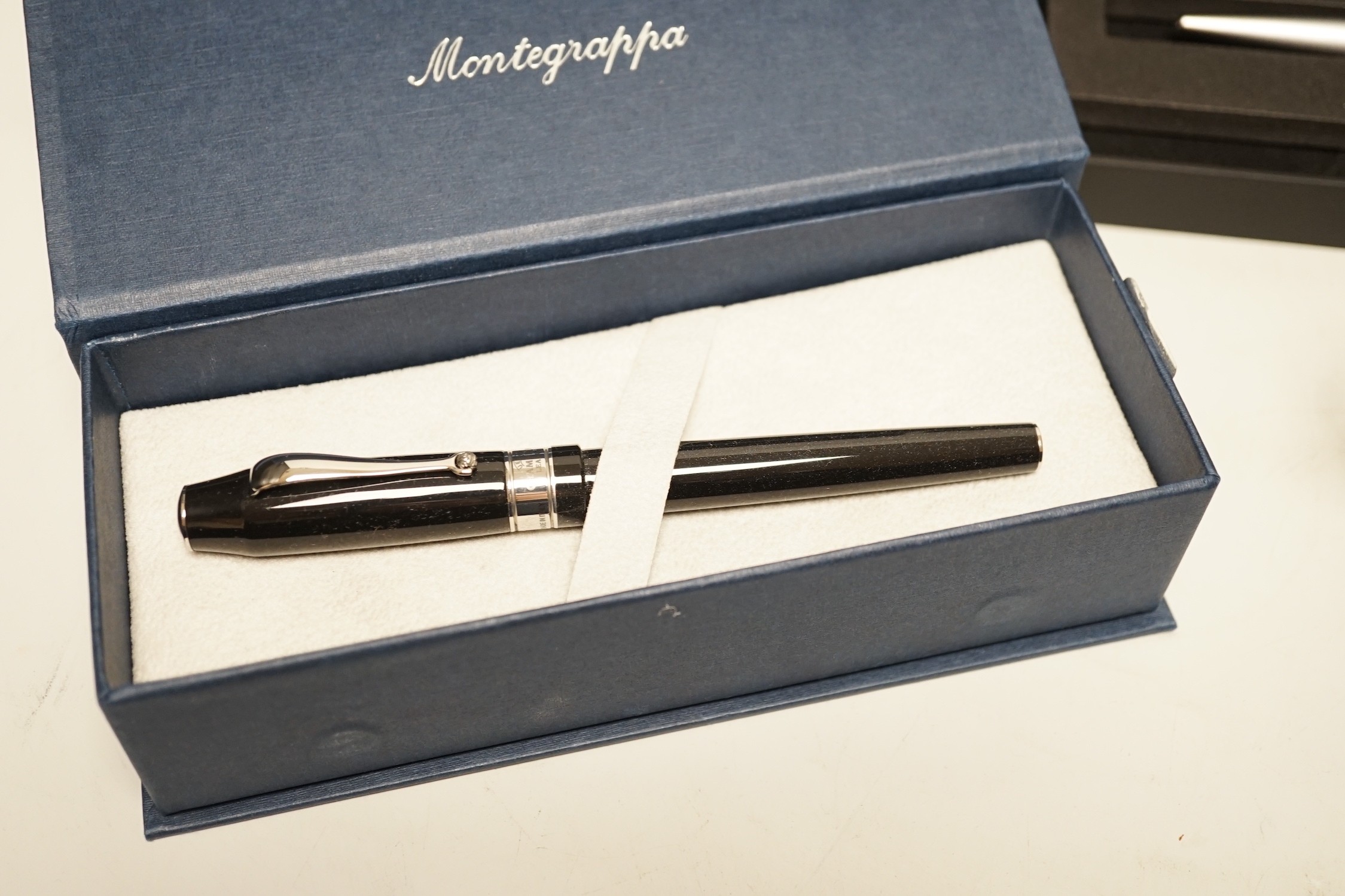 Two Dupont ballpoint pens and a Montegrappa Champions League Trophy fountain pen